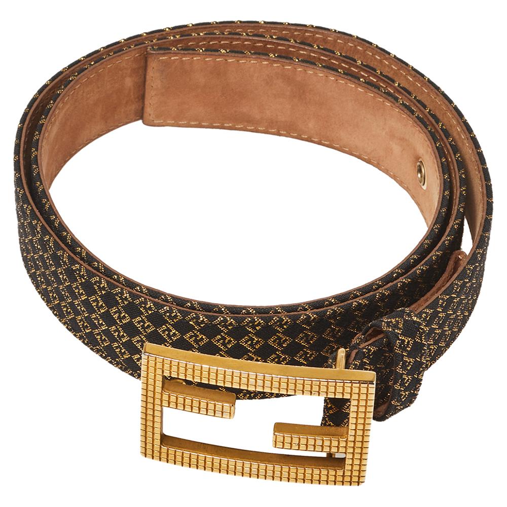 This chic and classy belt from Fendi will be an amazing buy! It is crafted from logo-printed fabric and leather and styled with a gold-tone 'FF' buckle and a single loop that seamlessly fastens it.

