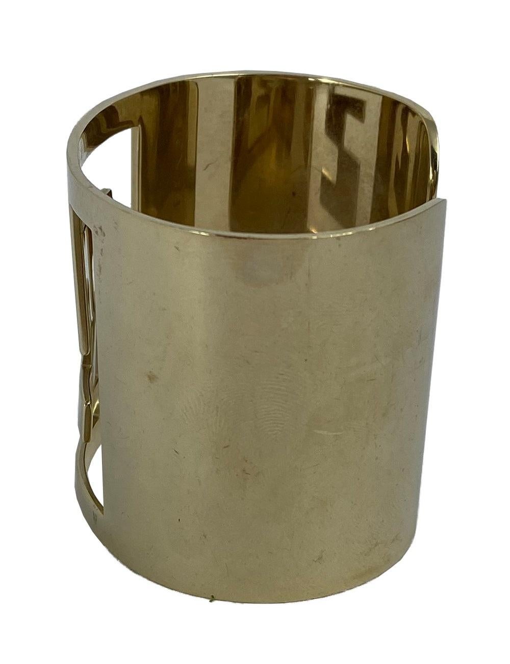 Fendi gold cuff bracelet, with Fendi logo cut out. In excellent condition.
