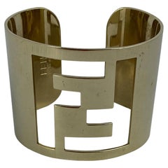 Fendi Gold Cuff Bracelet with Fendi Logo Cut Out