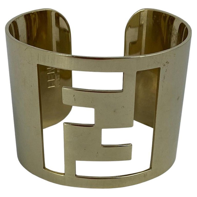 Fendi Gold Cuff Bracelet with Fendi Logo Cut Out For Sale at 1stDibs