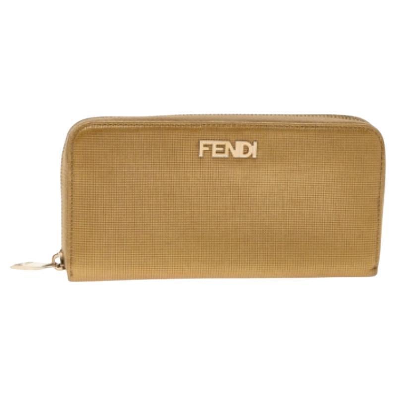 Fendi Cartera con cremallera de piel repujada en oro en venta