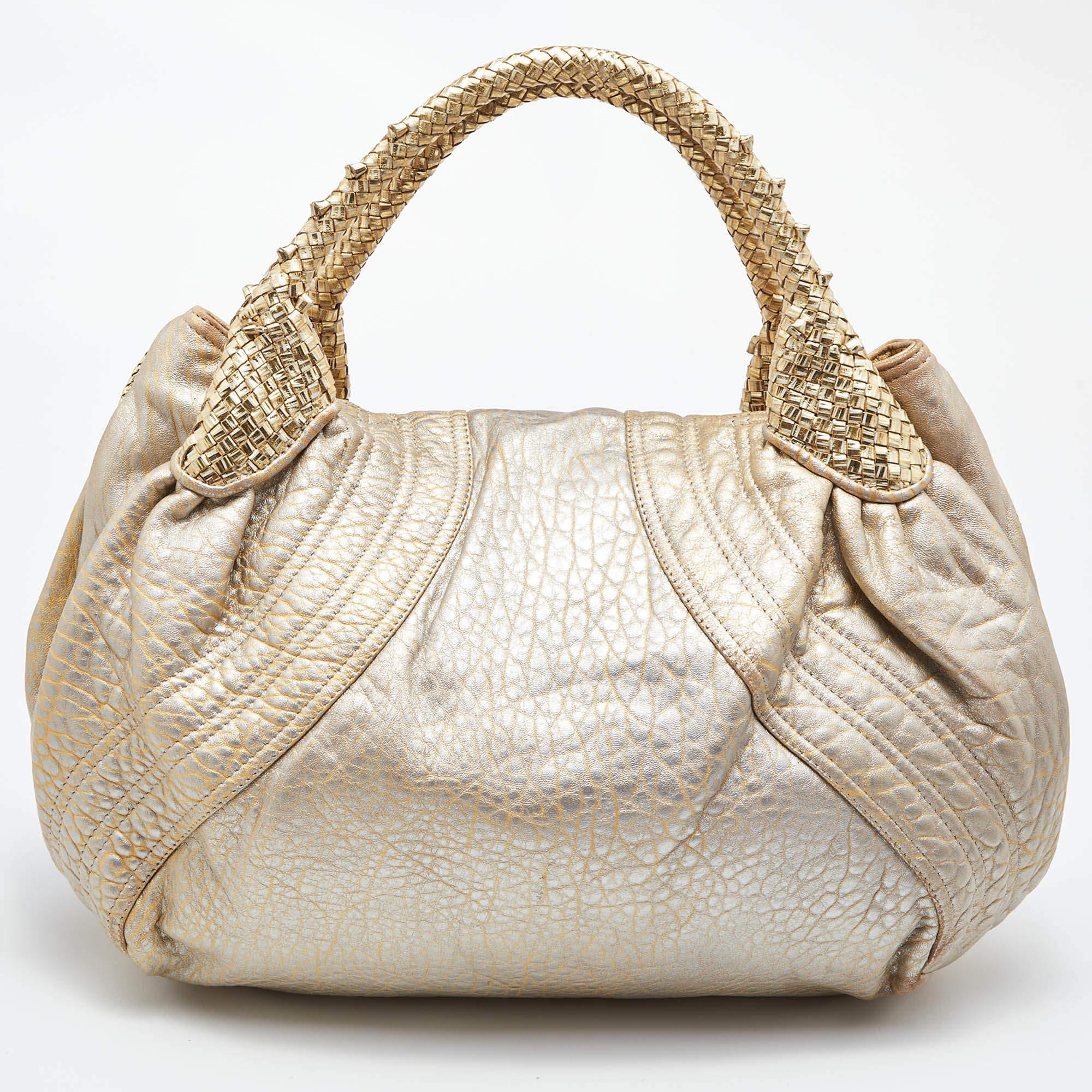Designer bags are ideal companions for ample occasions! Here we have a fashion-meets-functionality piece crafted with precision. It has been equipped with a well-sized interior that can easily fit all your essentials.

Includes: Original Dustbag,