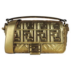 Fendi Baguette NM Tasche mit zwei Riemen aus goldenem Leder mit geprägtem Logo rt. $3.290
