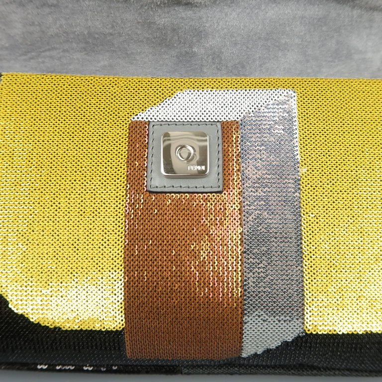 Is this fendi clutch authentic? The gold snap reads: PK3940