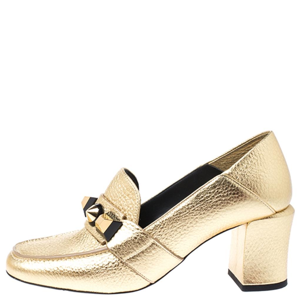 You can never go wrong with these loafer pumps by Fendi. These effortless pumps have been crafted from textured leather and come in a stunning shade of gold. Designed to deliver style and class, they feature geometric studs on the uppers, gold-tone