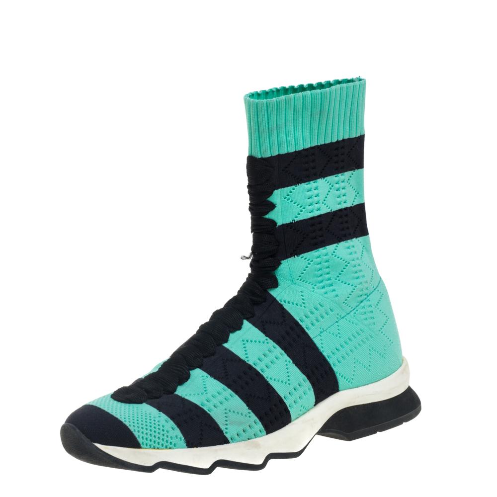 Designed in a sock-like silhouette, these sneakers from Fendi are crafted from knit fabric and feature an easy slip-on style. Play casual and cool wearing this pair that comes with black and green stripes and comfortable leather-lined insoles. These