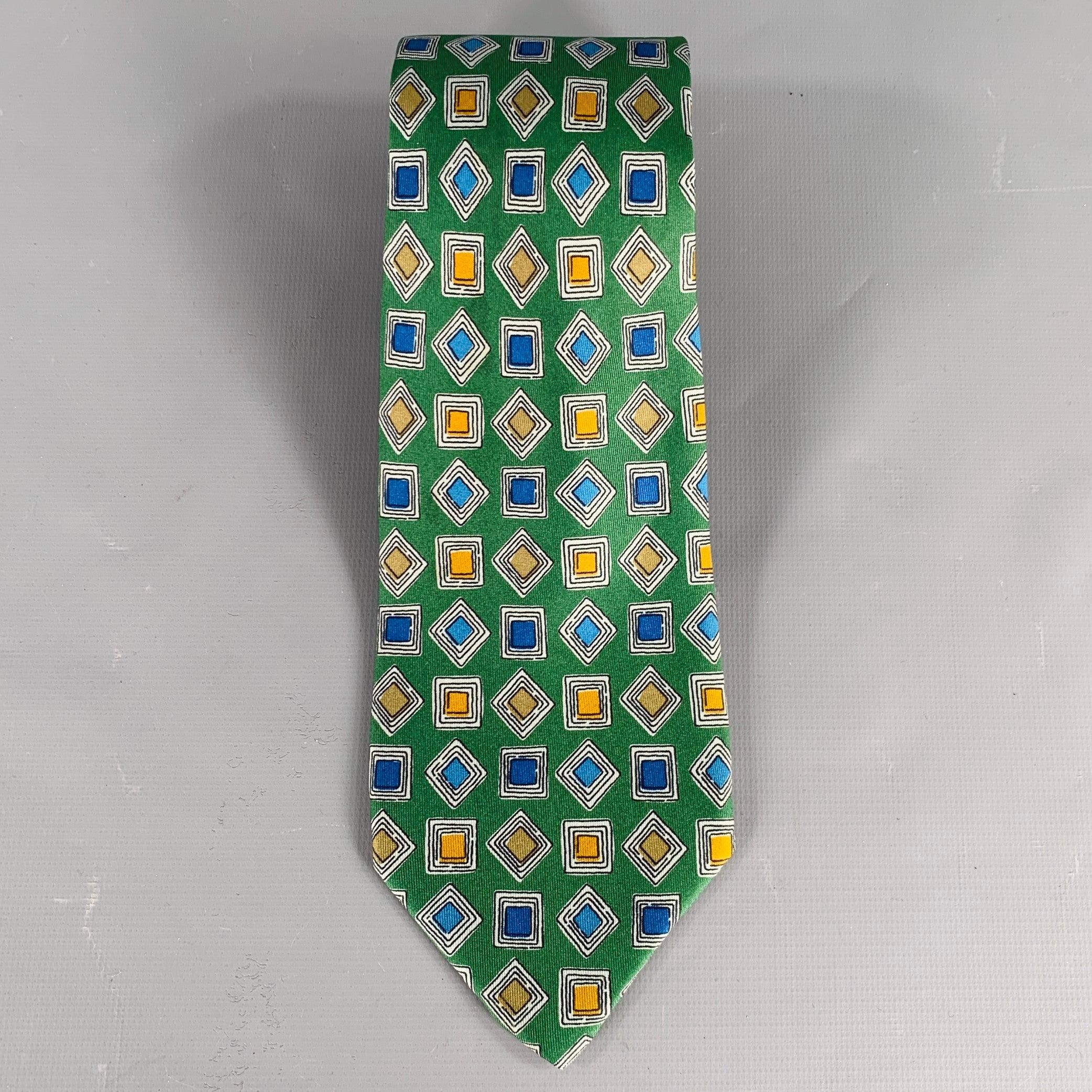 FENDI necktie
in a green and blue silk featuring a squares pattern. Handmade in Italy.Very Good Pre-Owned Condition. 

Measurements: 
  Width: 3.25 inches Length: 57 inches 
  
  
 
Sui Generis Reference: 133826
Category: Tie
More Details
   