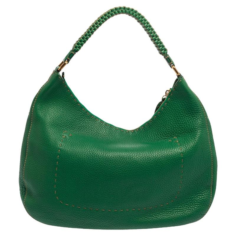 This stylish hobo is crafted to perfection with green leather and is adorned with hand-stitched Selleria details. The bag features a shoulder strap and a top zipper closure. The bag opens to an interior spacious enough for all of your necessities