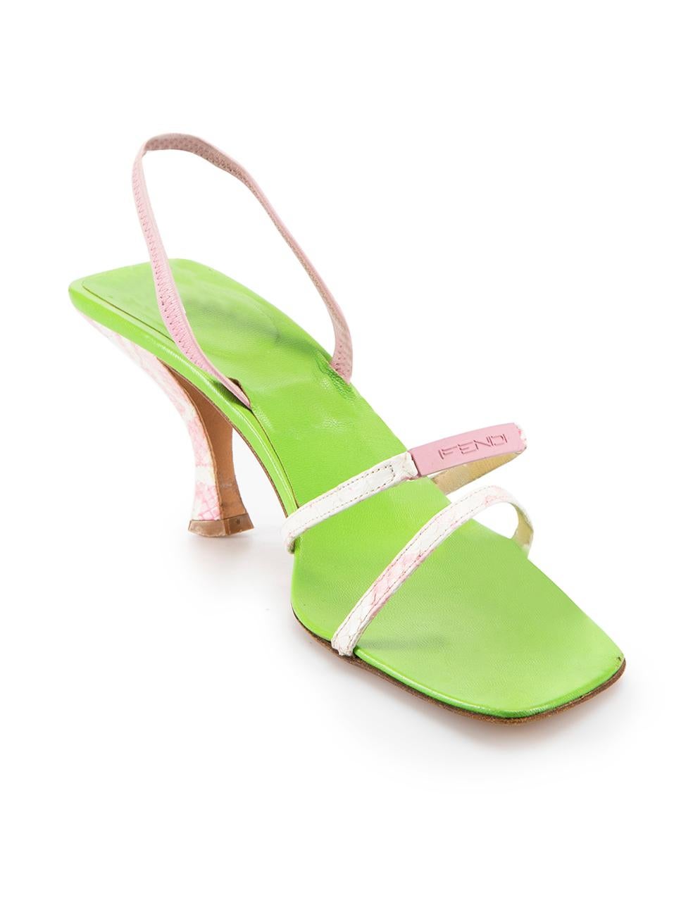 CONDITION is Good. General wear to shoes is evident. Moderate signs of wear to both toes, heels, metal logo plaques and footbeds with indents and scuffs. The snakeskin straps also show signs of glue on this used Fendi designer resale