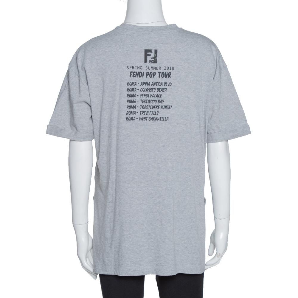This t-shirt from Fendi is a luxe addition to your wardrobe. Quality and style go together with this grey t-shirt. This cotton t-shirt features short sleeves, a simple neckline and detailing of prints and sequins.

