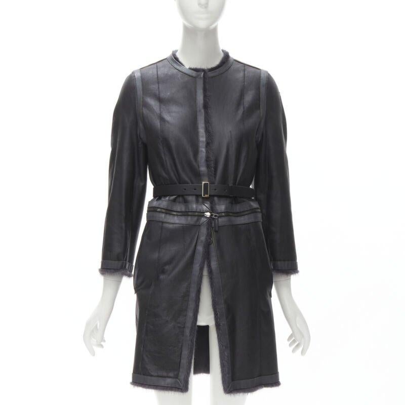 FENDI gris noir fourrure cuir 4-way réversible zip veste manteau ceinturée IT38
Référence : KNLM/A00076
Marque : Fendi
MATERIAL : Fourrure, cuir
Couleur : Noir, Gris
Motif : Solide
Fermeture : boutons-pression
Doublure :  Cuir
Détails