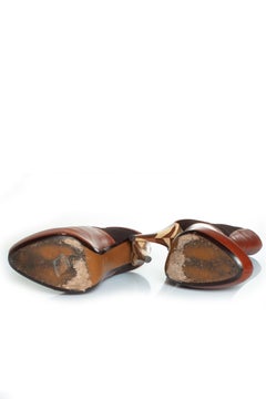 Fendi, hidden platform boots in cognac leather