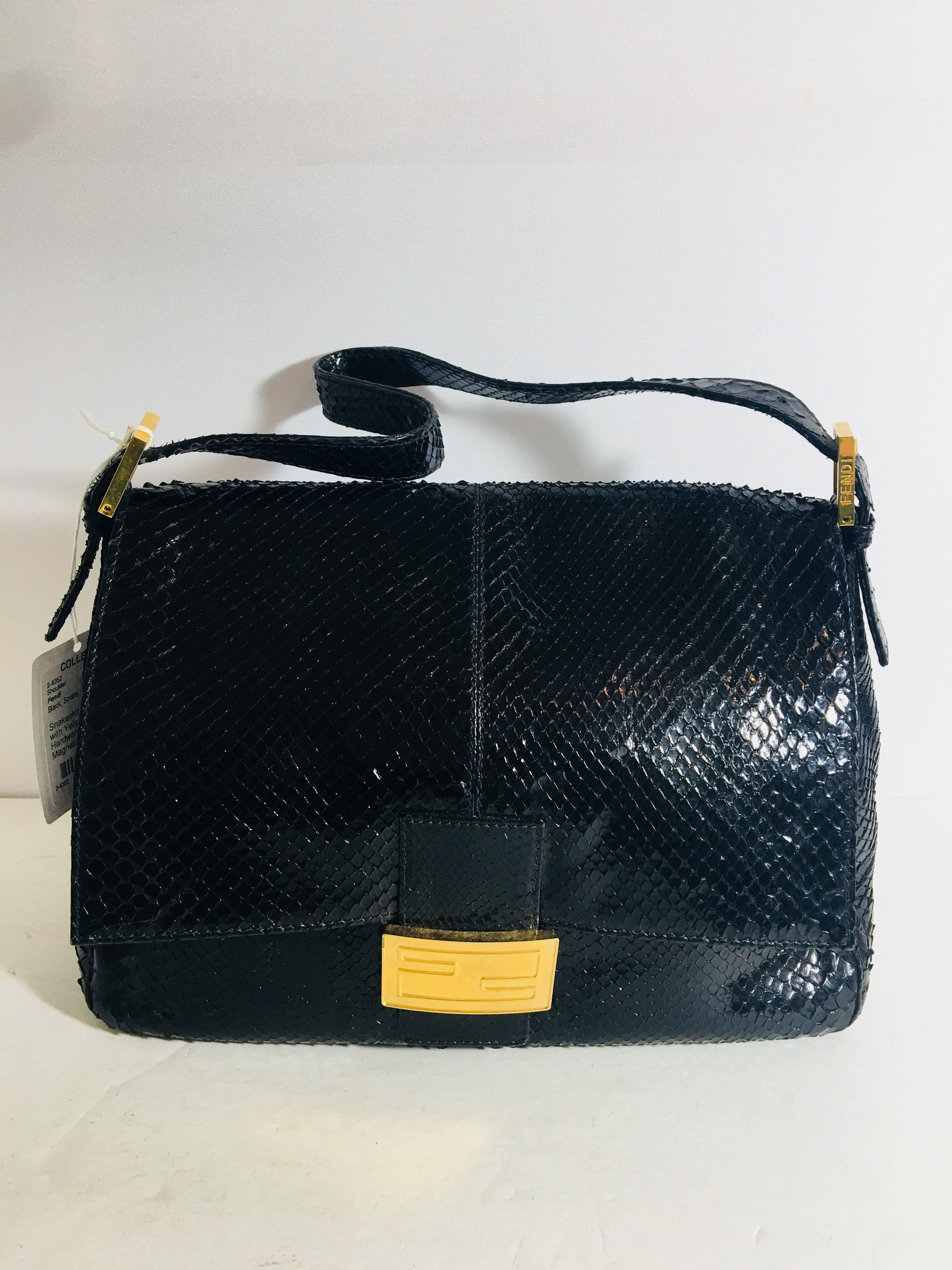 Fendi Black Snake Skin Hobo Bag with Yellow Gold Hardware and Magnetic Closure.