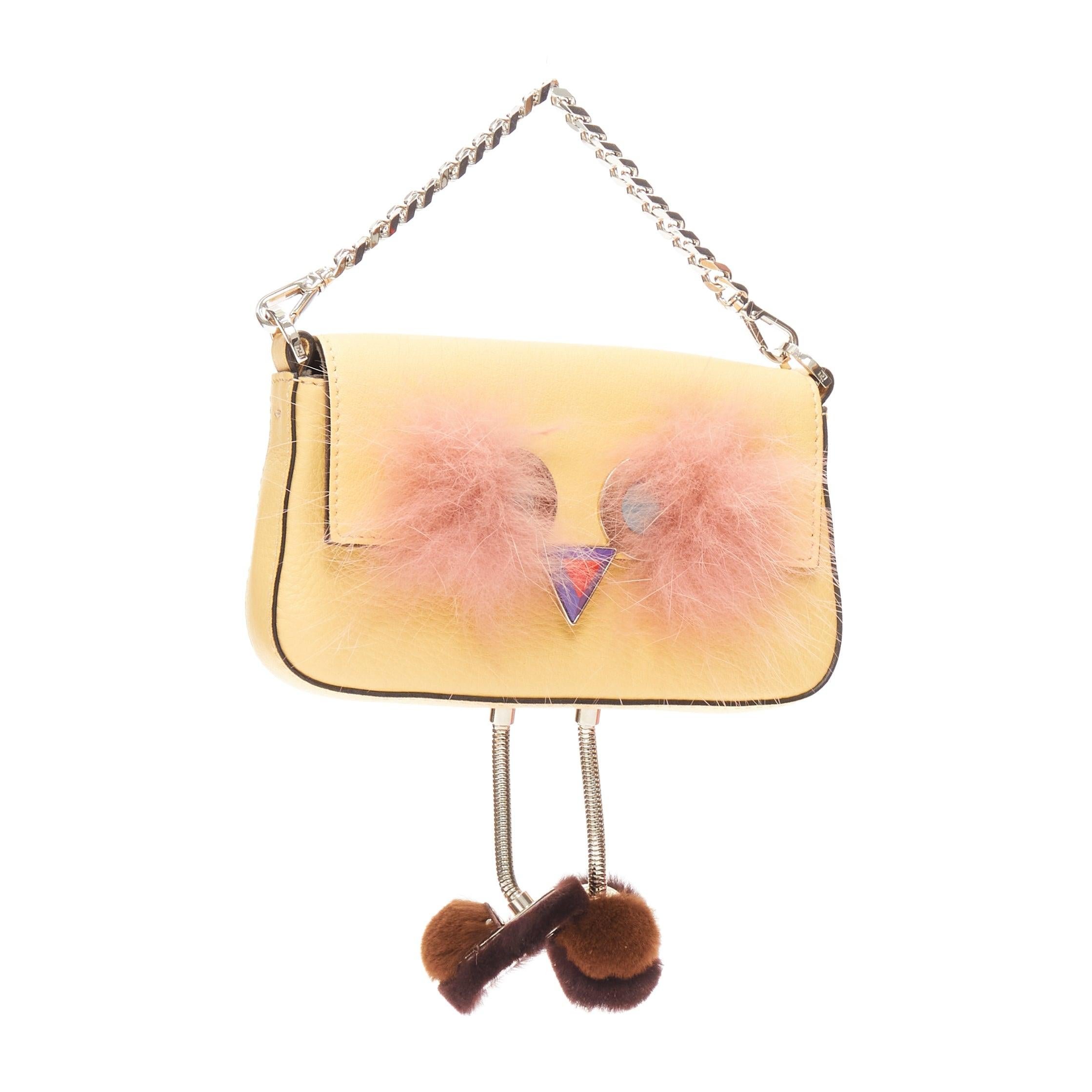 FENDI Hypnoteyes Micro Baguette pink rabbit fur yellow leather duckling bag
Reference: JACG/A00099
Brand: Fendi
Model: Baguette
Collection: Hypnoteyes
Material: Leather, Fur, Acrylic
Color: Yellow, Pink
Pattern: Solid
Closure: Snap Buttons
Lining:
