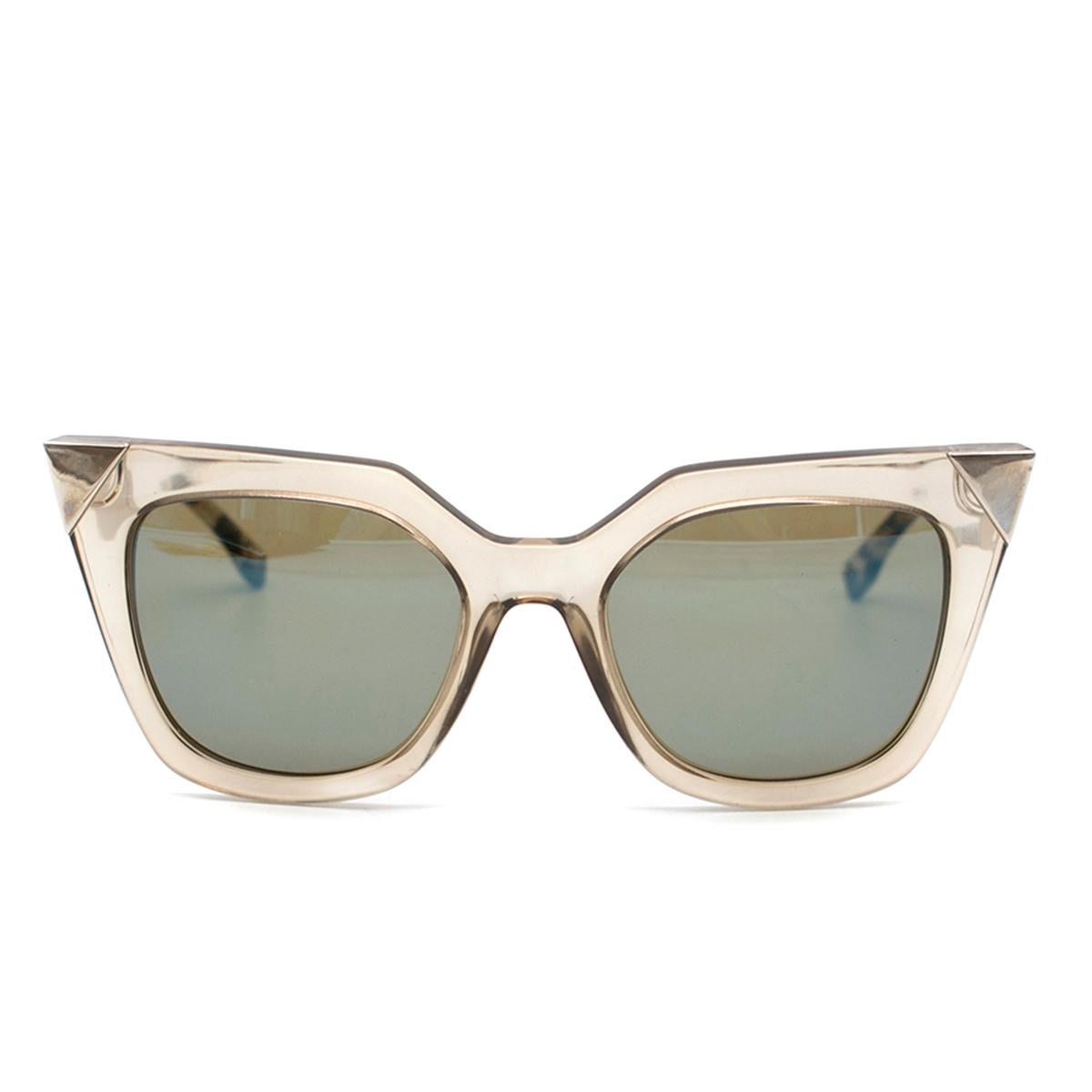 Fendi brown and silver sunglasses

-Sharp metal triangle at the tip of the frame
-UV400 lenses
- Made in Italy
-New Fendi glasses cloth
- Fendi leather cover

Please note, these items are pre-owned and may show some signs of storage, even when