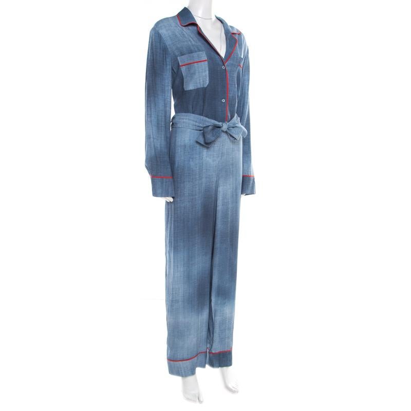 This stylish jumpsuit brought to you by the house of Fendi will definitely be your all time favorite. Show off your style and attitude with this blue jumpsuit, detailed with contrasting trims and a bow detail. Highlight your fashion choices with