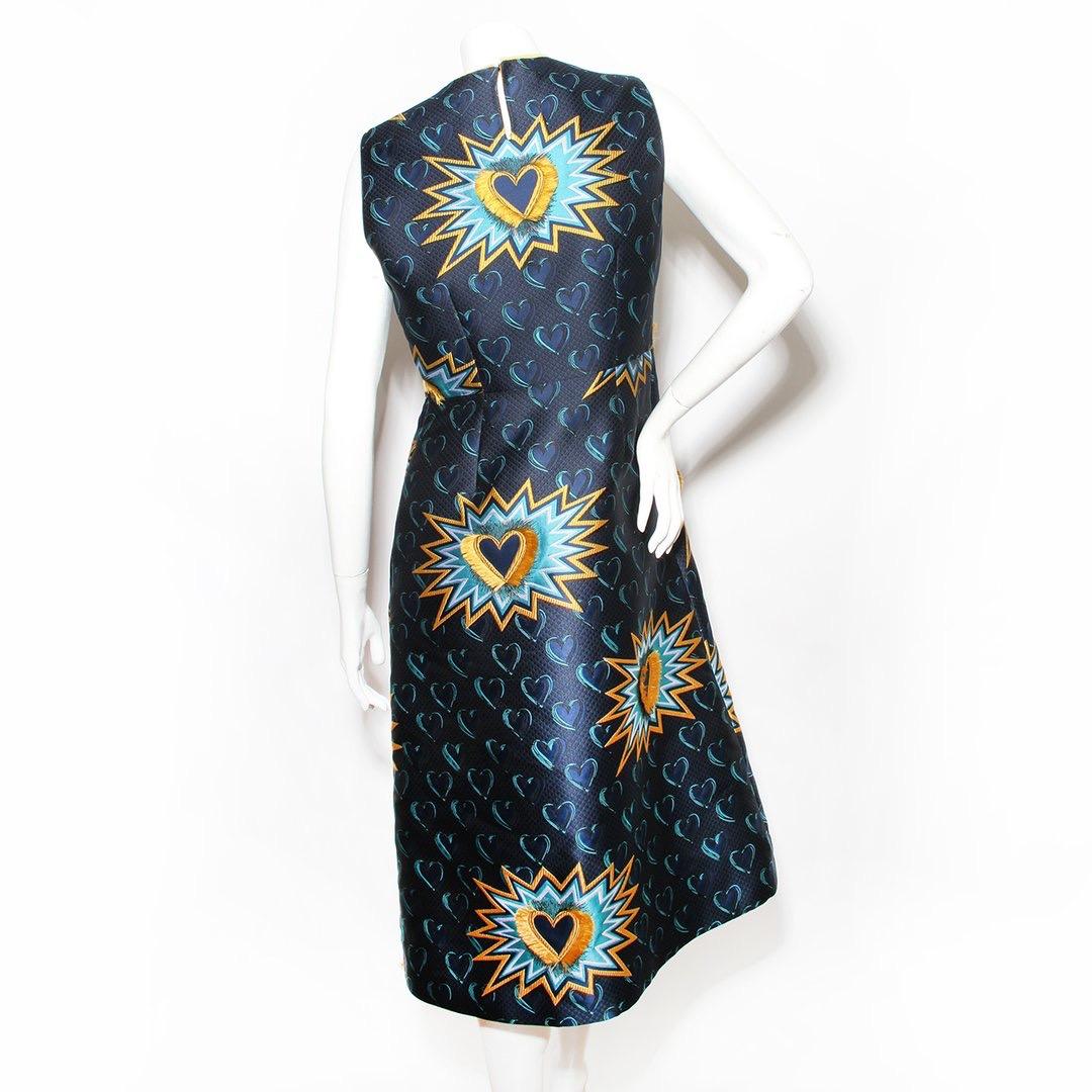 Jacquard heart dress by Fendi
Prefall 2018 RTW collection
Blue and yellow 
Heart pattern 
Fringe edge details throughout 
Front slit 
Sleeveless 
Keyhole back with button neck closure 
Zip side closure 
Made in Italy 
Condition: Excellent, like new.