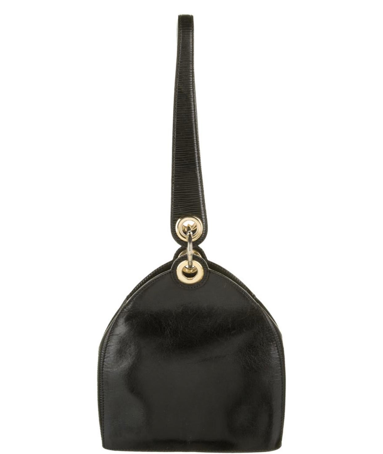 Fendi Janus black leather bag with gold tone hardware. Single interior pocket. 

7.5