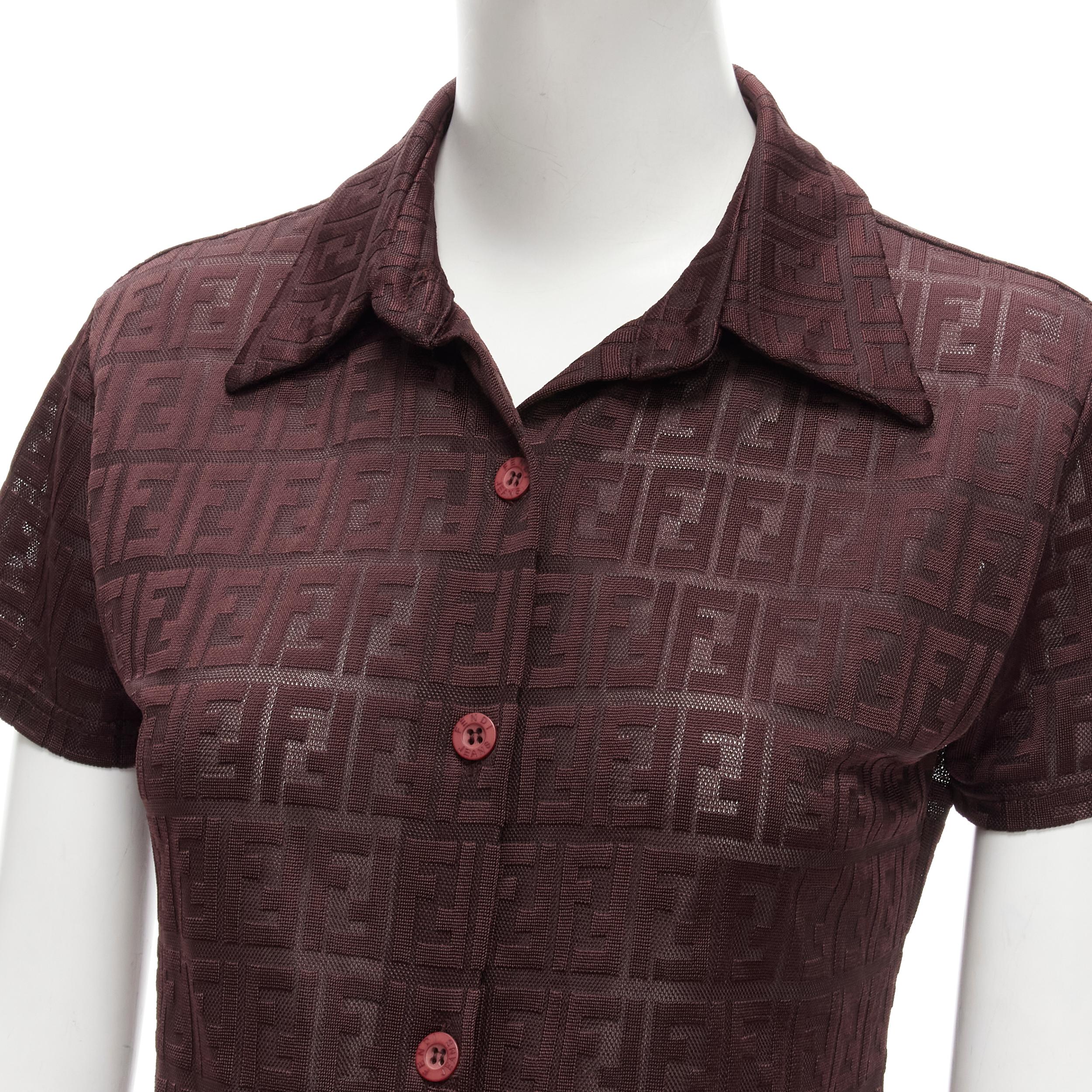 FENDI JEANS Vintage Y2K burgundy FF Zucca intarsia sheer polo shirt
Reference: TGAS/C01718
Brand: Fendi
Collection: Vintage Jeans label
Material: Polyester, Blend
Color: Burgundy
Pattern: Monogram
Closure: Button
Made in: