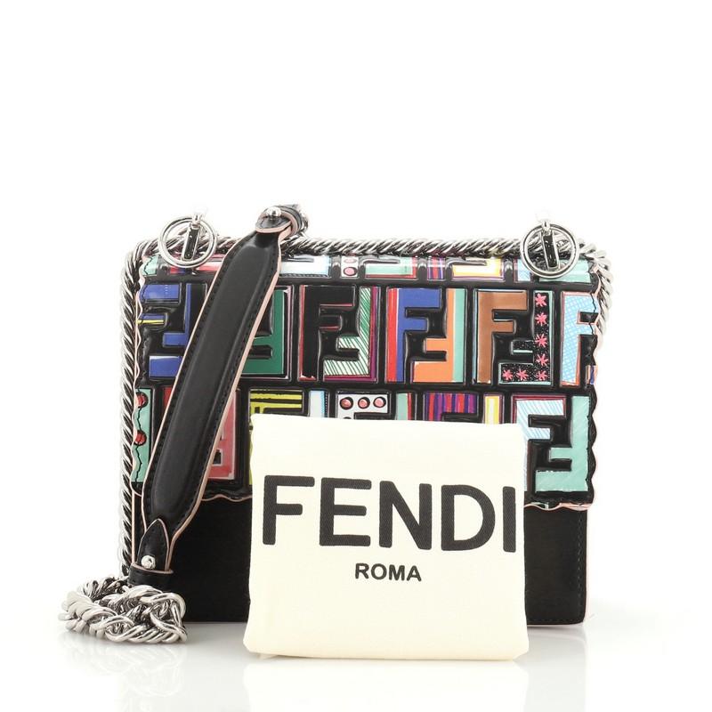 This Fendi Kan I Bag Leather with Zucca Embossed Patent Small, crafted from black leather with vibrant and colorful Fun Fair logo motif on the scalloped flap, features chain-lik strap, double stud two-tone plexiglass twist-lock closure and