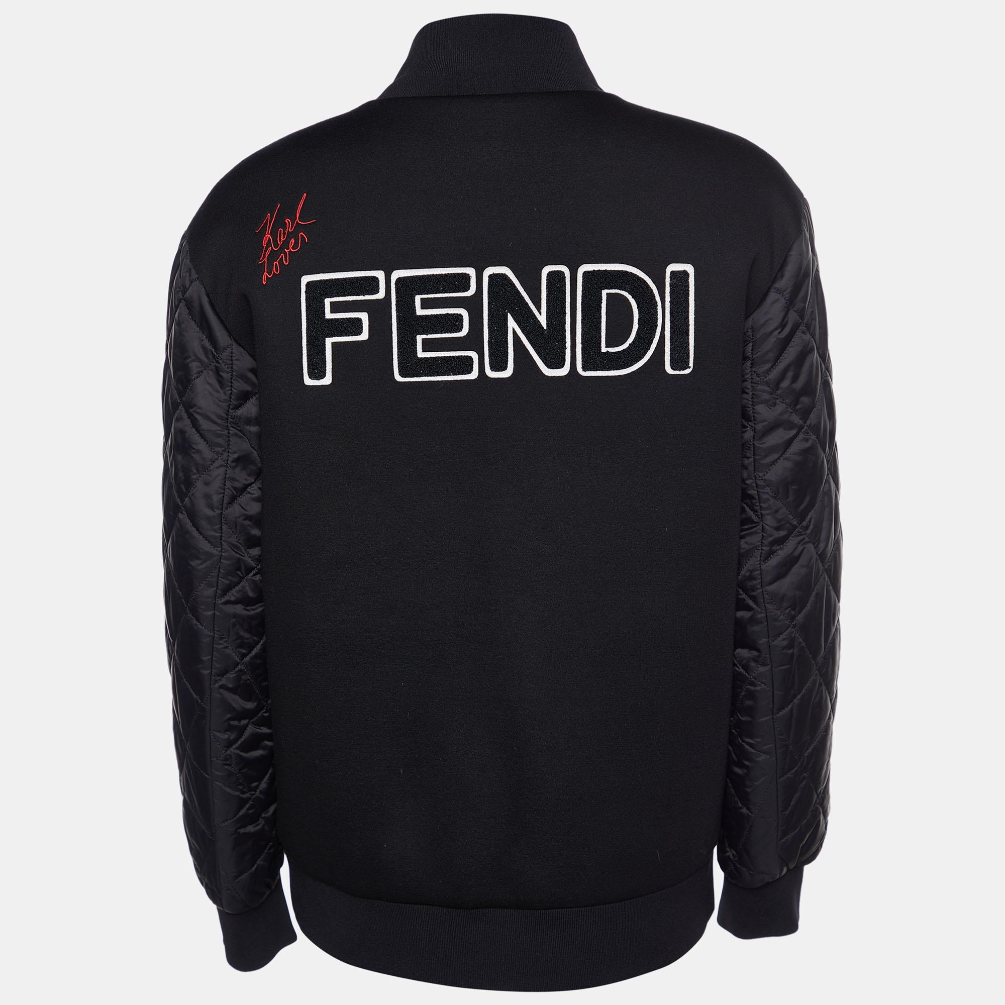 Celebrating its creative director-Karl Lagerfield, this Karlito bomber jacket from Fendi spells luxury like no other. The chic black jacket is made of a blend of fabrics and features Karl's face logo applique detailing on the front. It flaunts front