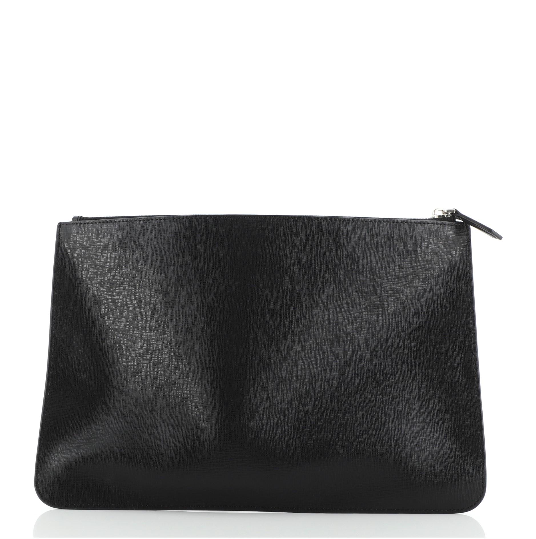 Fendi Karlito Pouch Studded Saffiano Leather Medium
Black

Condition Details: Slight scuffs and wear on exterior, scratches on hardware.

51849MSC

Height 8