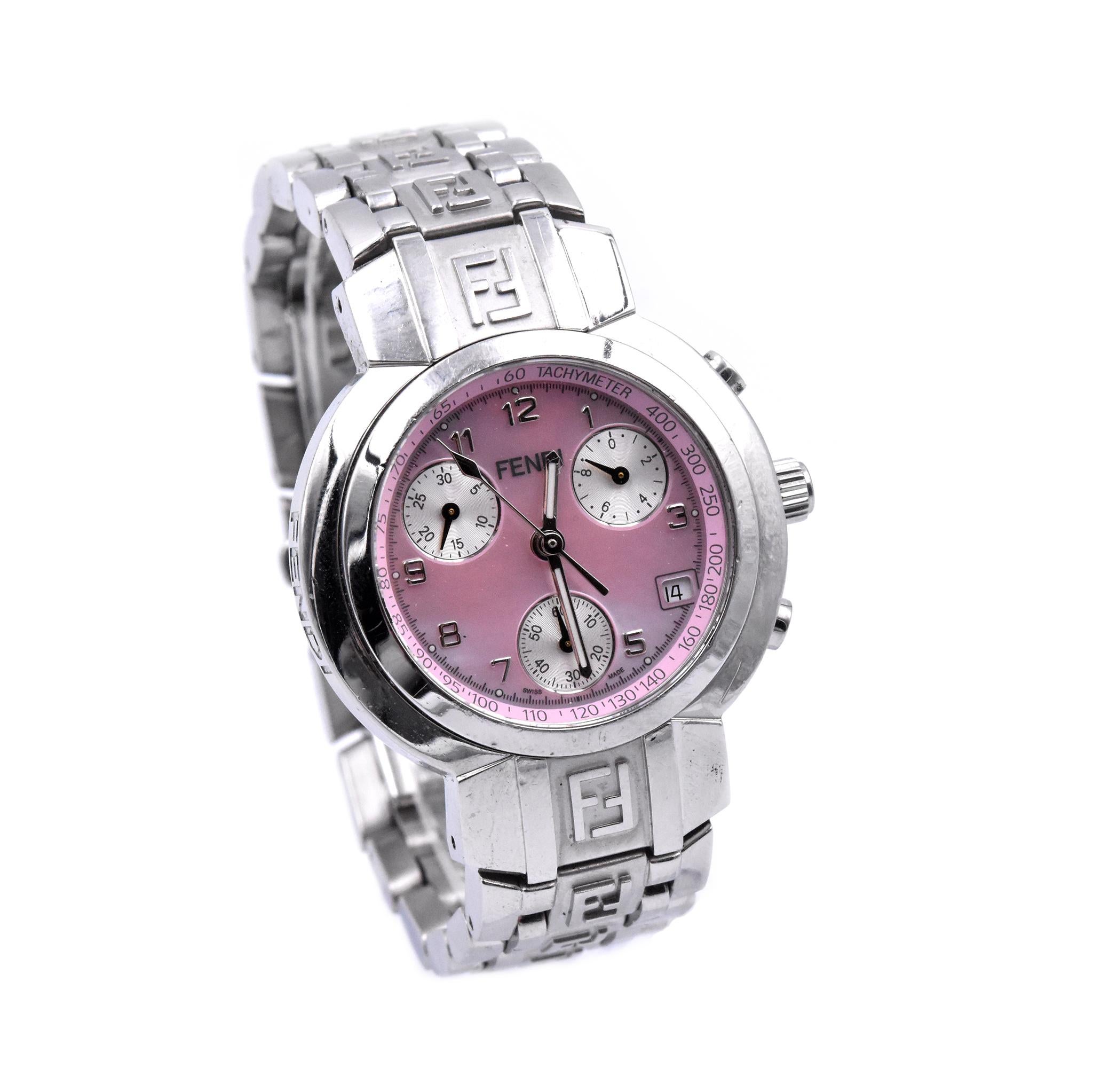 Movement: quartz
Function: hours, minutes, seconds
Case: 32mm round case, push/pull crown, sapphire crystal
Band: stainless steel bracelet, butterfly clasp
Dial: pink mother-of-pearl dial, white sub dials
Serial #: 059-45-XXX

Comes with original