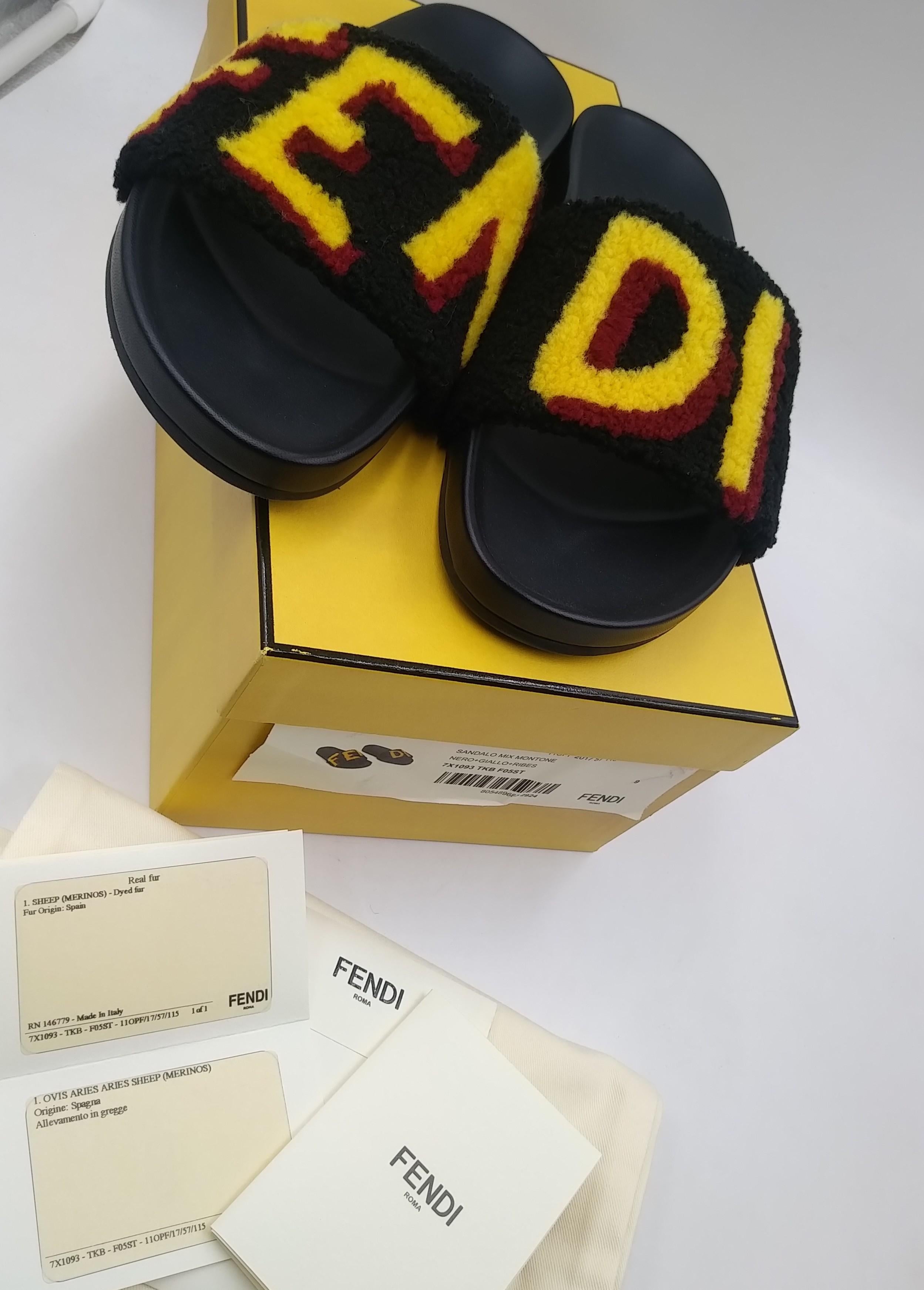 Women's or Men's Fendi leather and fur slides slippers, size EU 41 For Sale