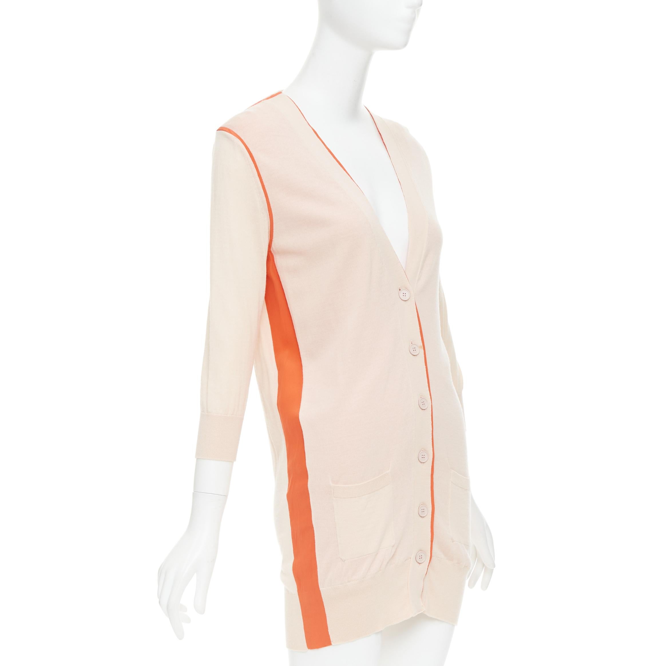 FENDI rosa-orangefarbene lange Strickjacke mit Besatz aus 100% Wolle IT40 S
Referenz: GEGG/A00186
Marke: Fendi
MATERIAL: Wolle
Farbe: Rosa, Orange
Muster: Solide
Verschluss: Knopf
Zusätzliche Details: Orangefarbener Frabic-Besatz.
Hergestellt in: