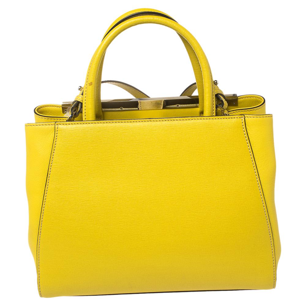 Fendi's 2Jours tote is one of the most iconic designs from the label and it still continues to receive the love of women around the world. Crafted from lime yellow leather, this bag features double handles. It is also equipped with a leather and
