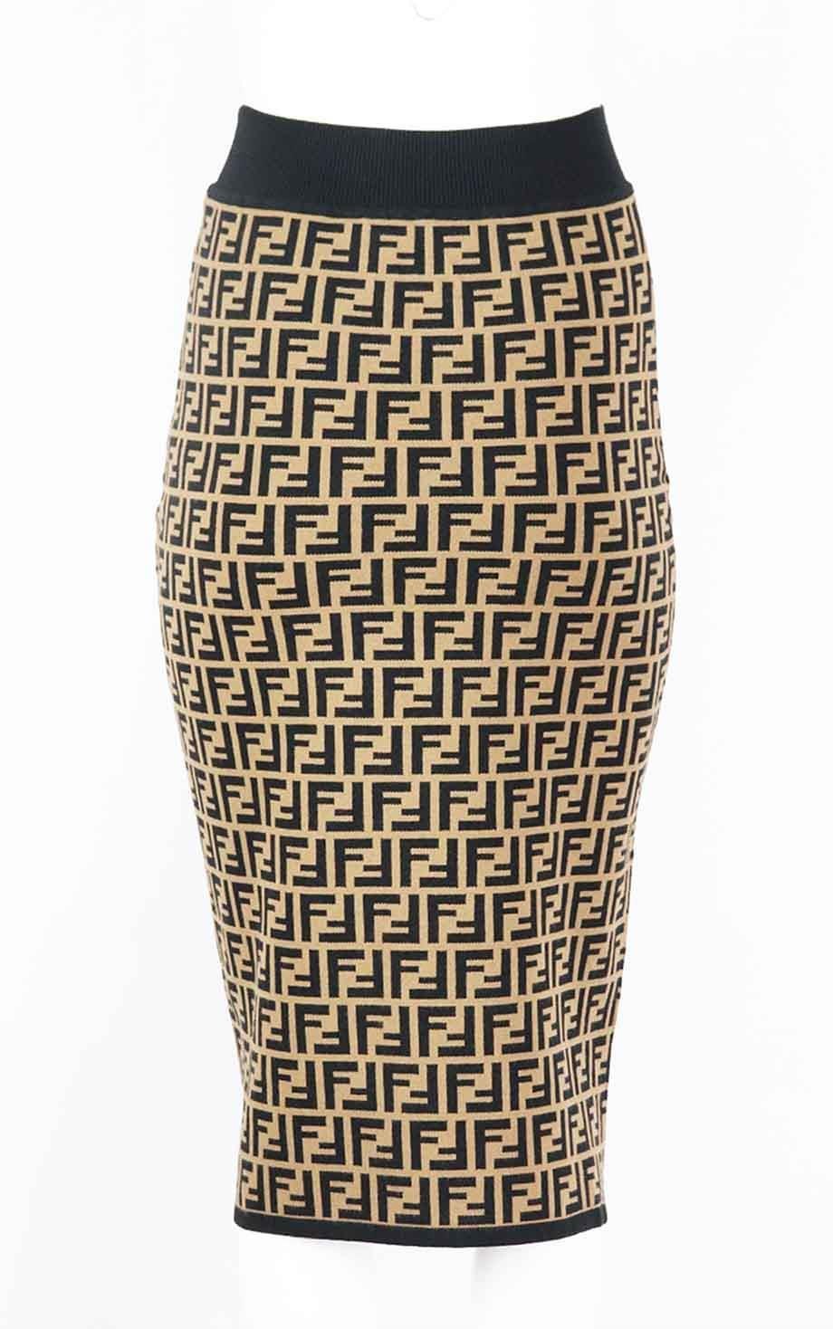This midi skirt by Fendi is made from a flexible FF jacquard-knit, this skirt has a ribbed waistband that sits at your narrowest point and fits slim through the hips. Black and brown viscose-blend. Pull on. 67% Viscose, 33% polyester. Size: IT 42