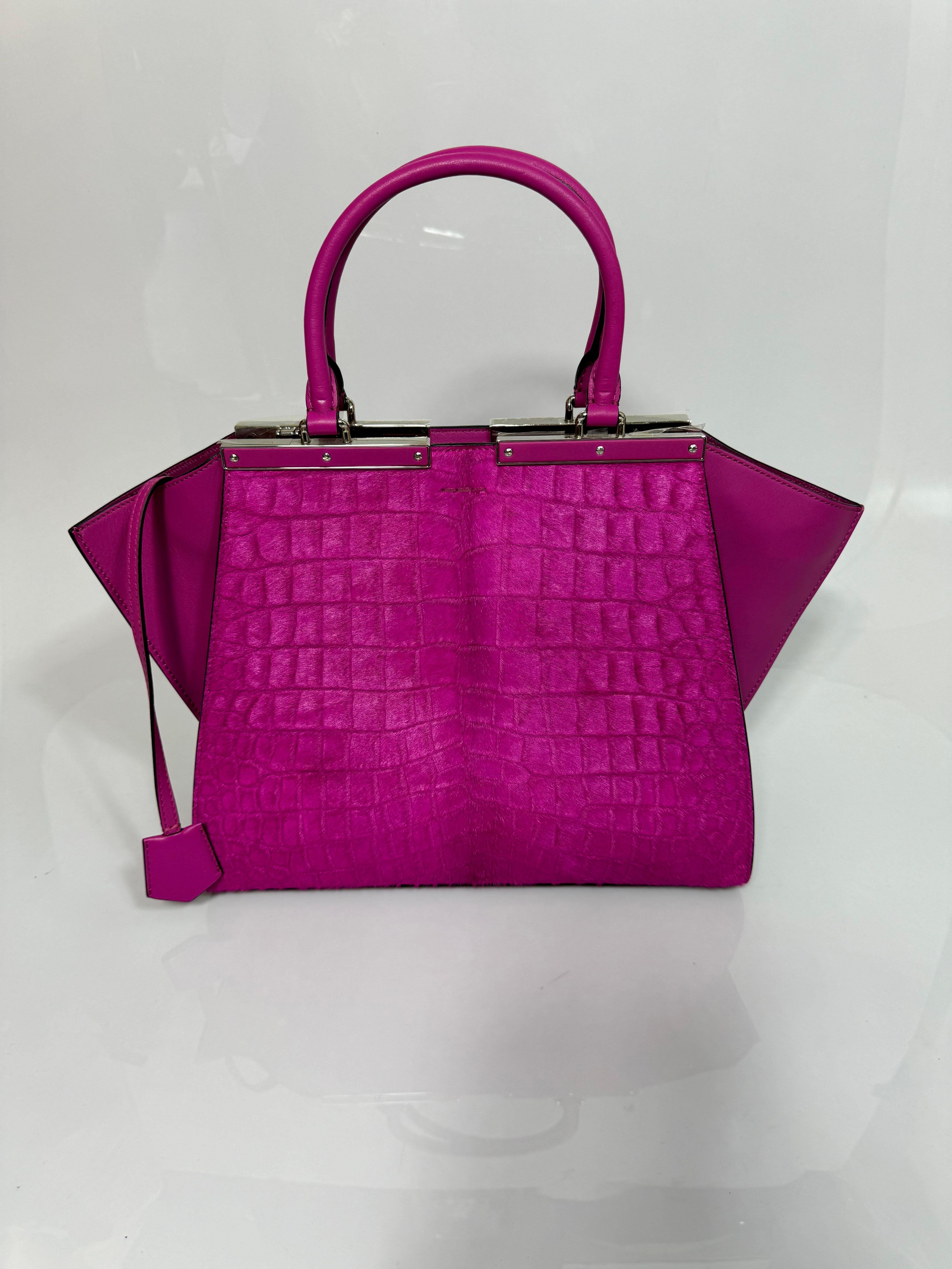 Fendi Magenta Calf 3Jours Handbag- NEW Never Carried  This is an authentic FENDI 3Jours Tote in Magenta Croc Printed Pony Hair and calfskin Leather. The retail on this bag was $3,450 as seen in the pictures. This lovely tote features leather strap