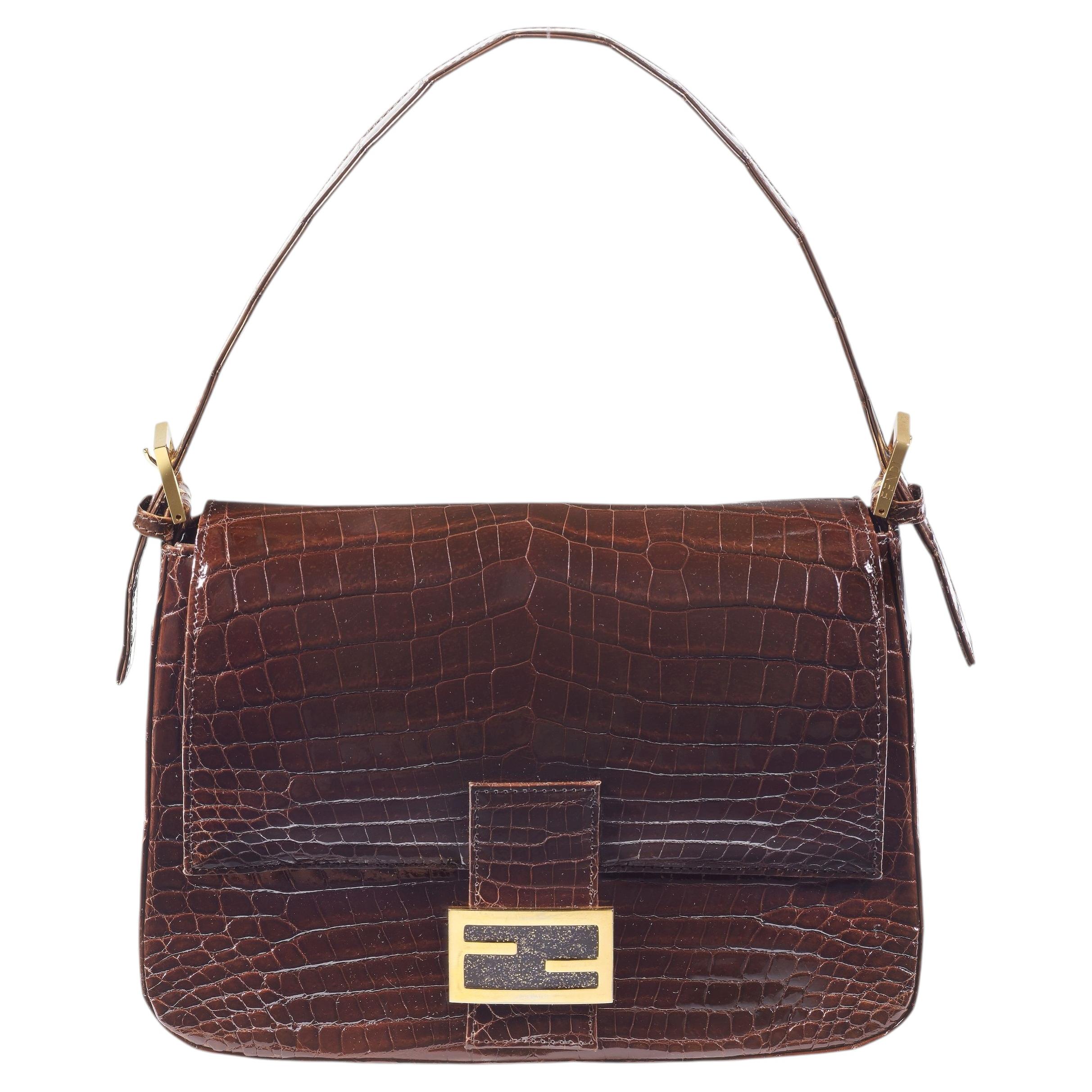 Who is the current designer for Fendi?