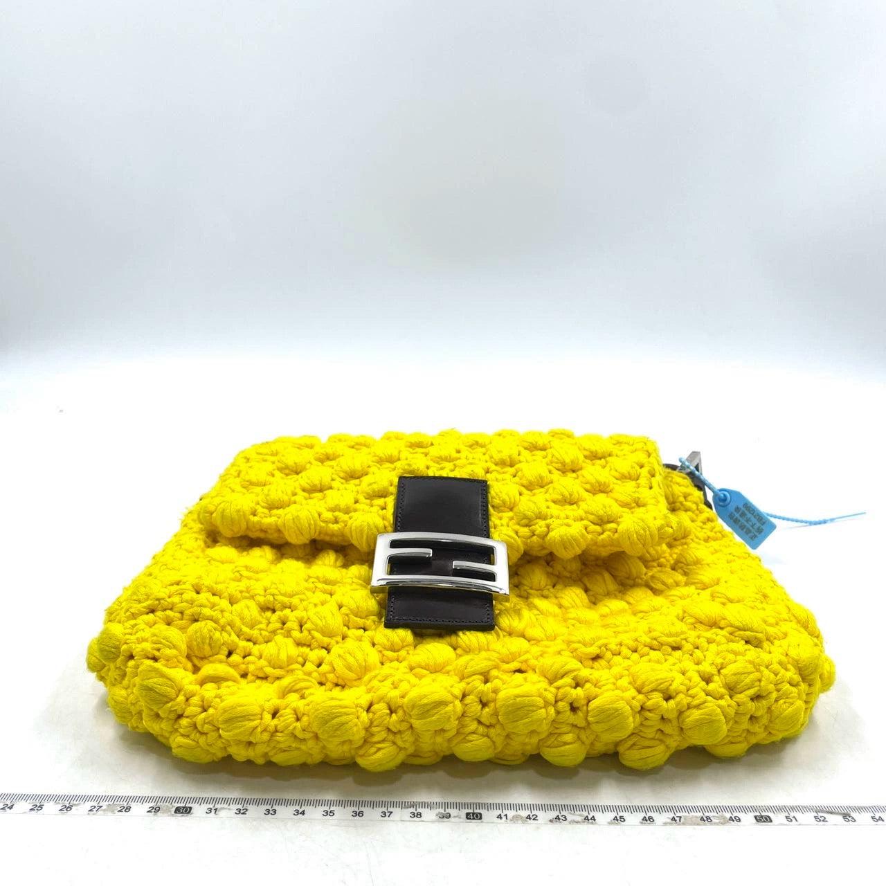 Fendi Mamma Baguette Bag Yellow Crochet Shoulder Bag

  This Fendi Baguette in yellow wool with pompoms are super cute. It‚Äôs a great winter accessory. 
  In Very good condition, this Fendi baguette bag has some light signs of wear and light