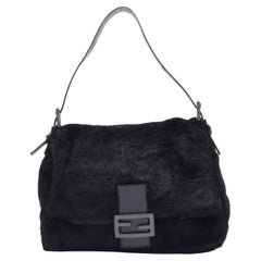FENDI Mamma Baguette black genuine fur FF buckle flap shoulder bag