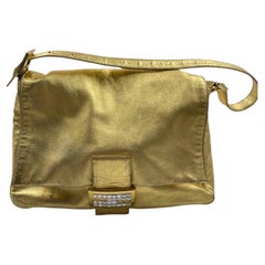 Fendi Mamma Baguette Piel de cordero dorada Hebilla de cristal