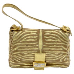 Fendi Mamma Baguette Piel de cordero dorada Rayas de cebra estilo poni