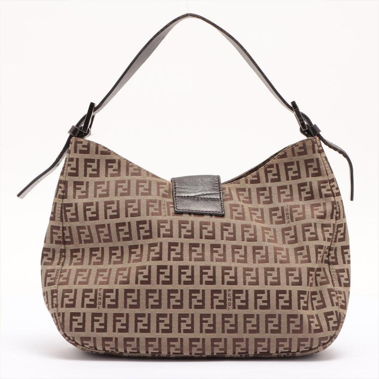 Fendi Mamma Baguette shoulder bag features a beige and brown Zucchino ...