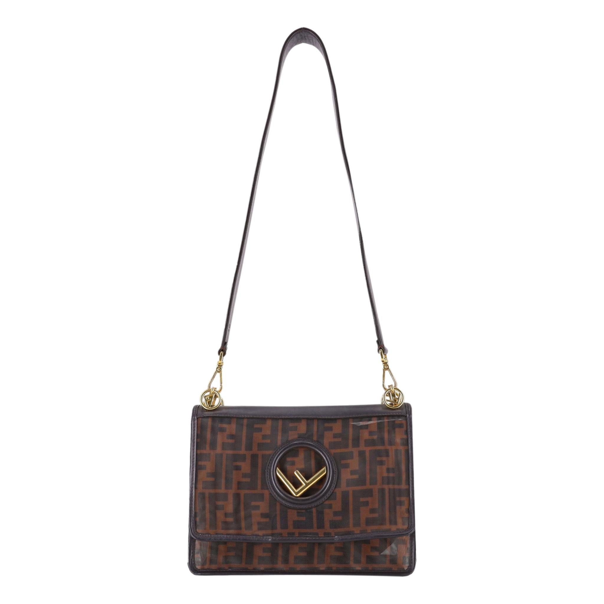 Fendi Mesh Vitello Century 'FF' Monogram 1974 Kan Shoulder Bag

Brown shoulder bag crafted from a combination of mesh and Vitello Century leather.

Designed with Fendi's iconic FF 1974 logo embossed on the front flap and dual-tone hardware including