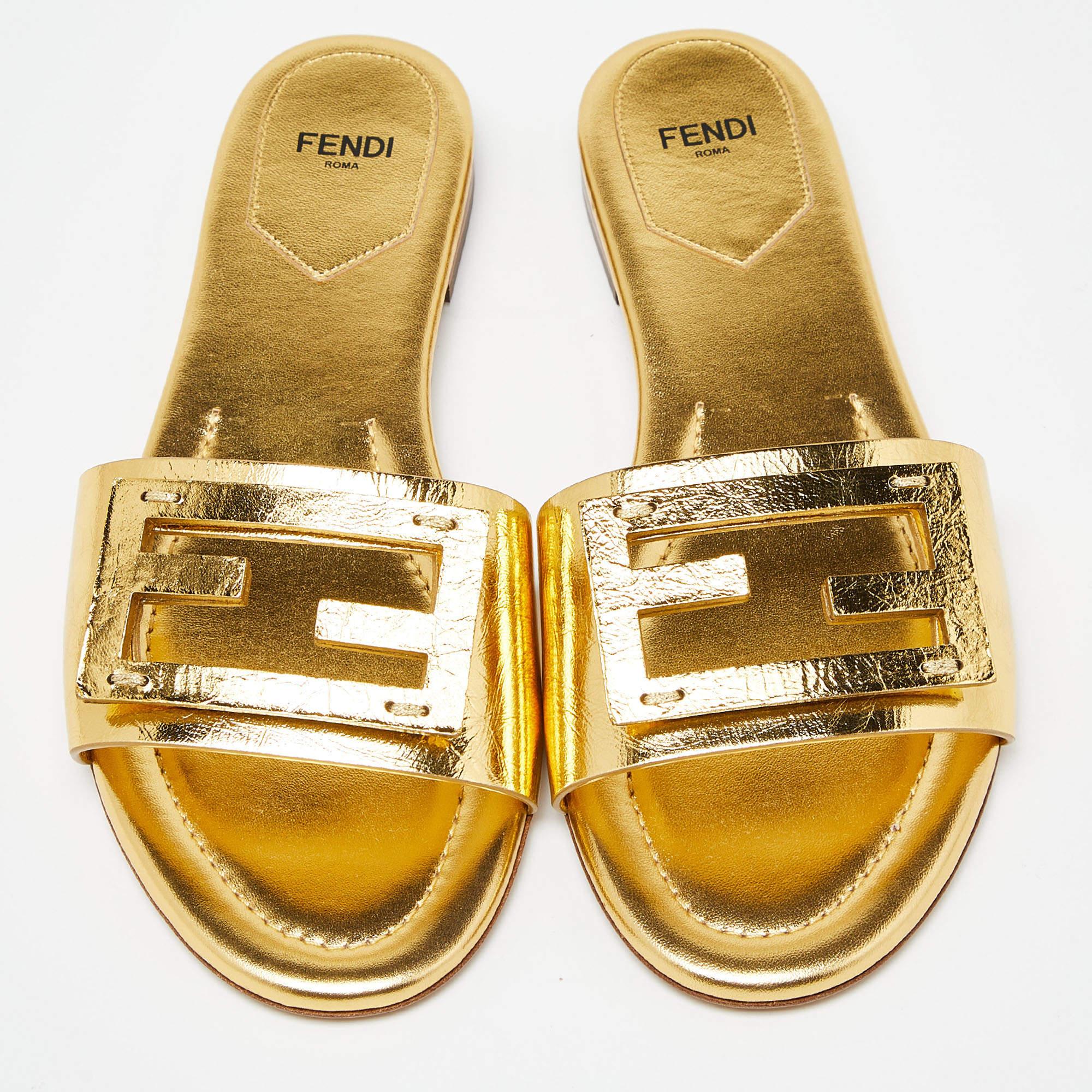 These Baguette slides from Fendi have been designed to lift your style. They are crafted from leather and are designed to secure your feet in a fashionable way.

Includes: Original Dustbag

