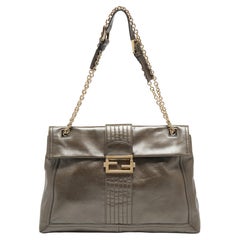 Fendi Studded Leather Baguette  Rent Fendi Handbags for $195/month