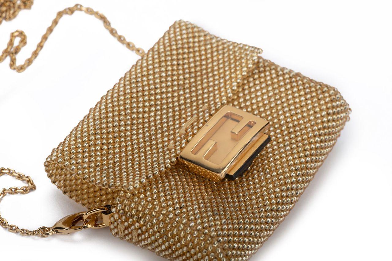 fendi gold baguette bag