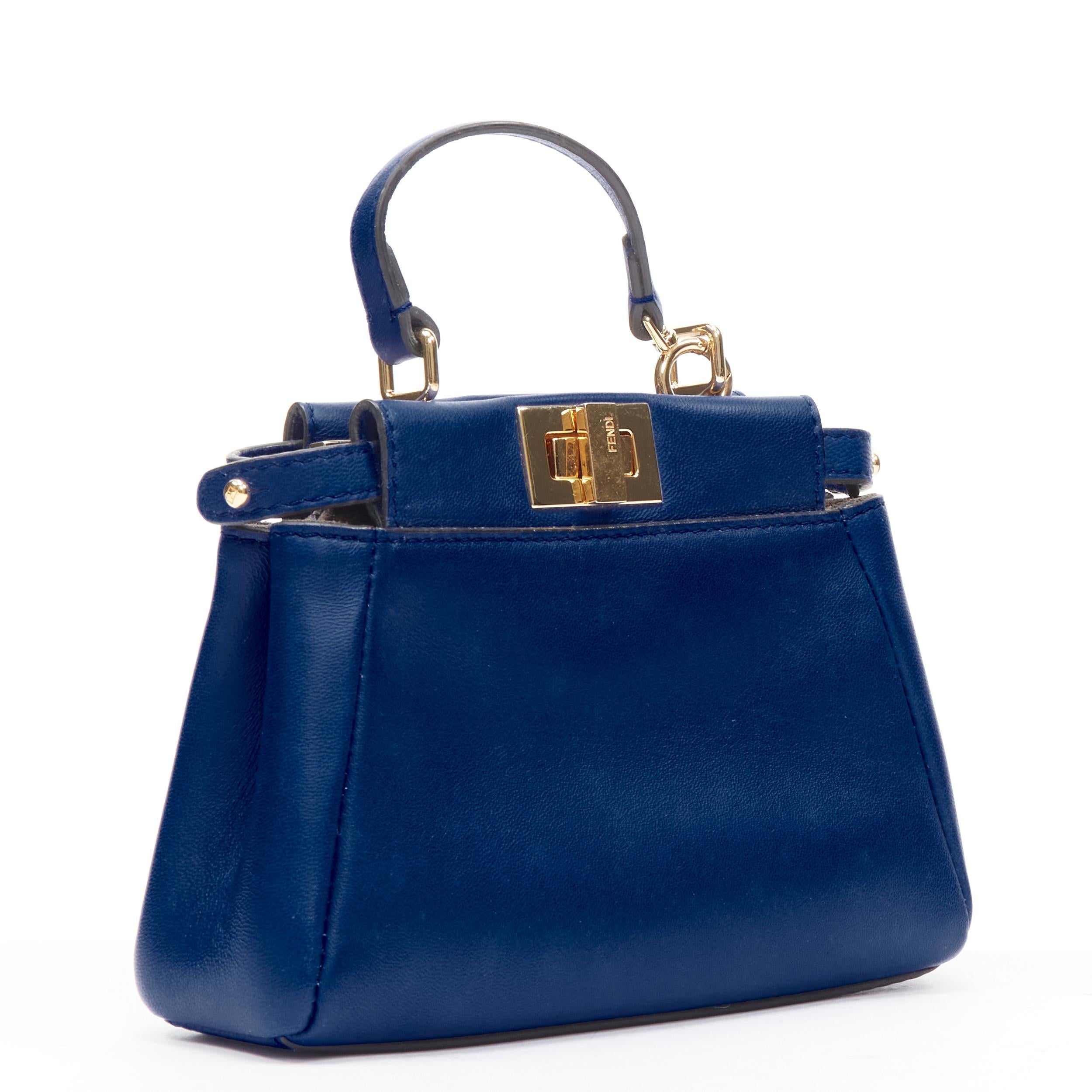 FENDI Micro Peekaboo blue leather gold hardware crossbody bag
Reference: TACW/A00022
Brand: Fendi
Model: 8M0355K471585177
Material: Leather
Color: Blue
Pattern: Solid
Closure: Turnlock
Lining: Leather
Estimated Retail Price: USD