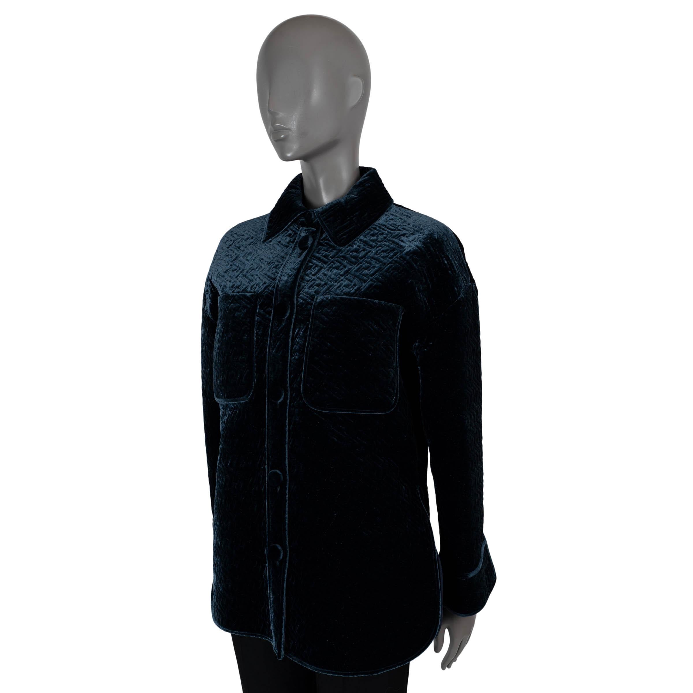 100% authentic Fendi belted Go-To oversized jacket in midnight blue velvet viscose (80%) and silk (20%). Features allover Zucca quilting, two chest patch pockets and buttoned cuffs. Closes with fabric covered buttons on the front and a thin