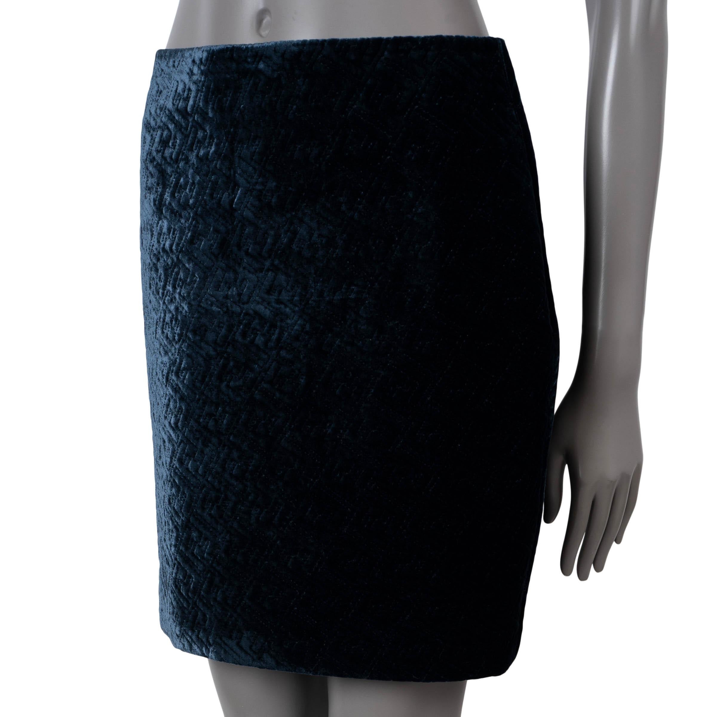 100% authentic Fendi hight-waisted mini skirt in midnight blue velvet viscose (80%) and silk (20%). Features allover Zucca quilting. Opens with a concealed zipper on the side. Unlined. Has been worn and is in excellent condition. 

Complete the look