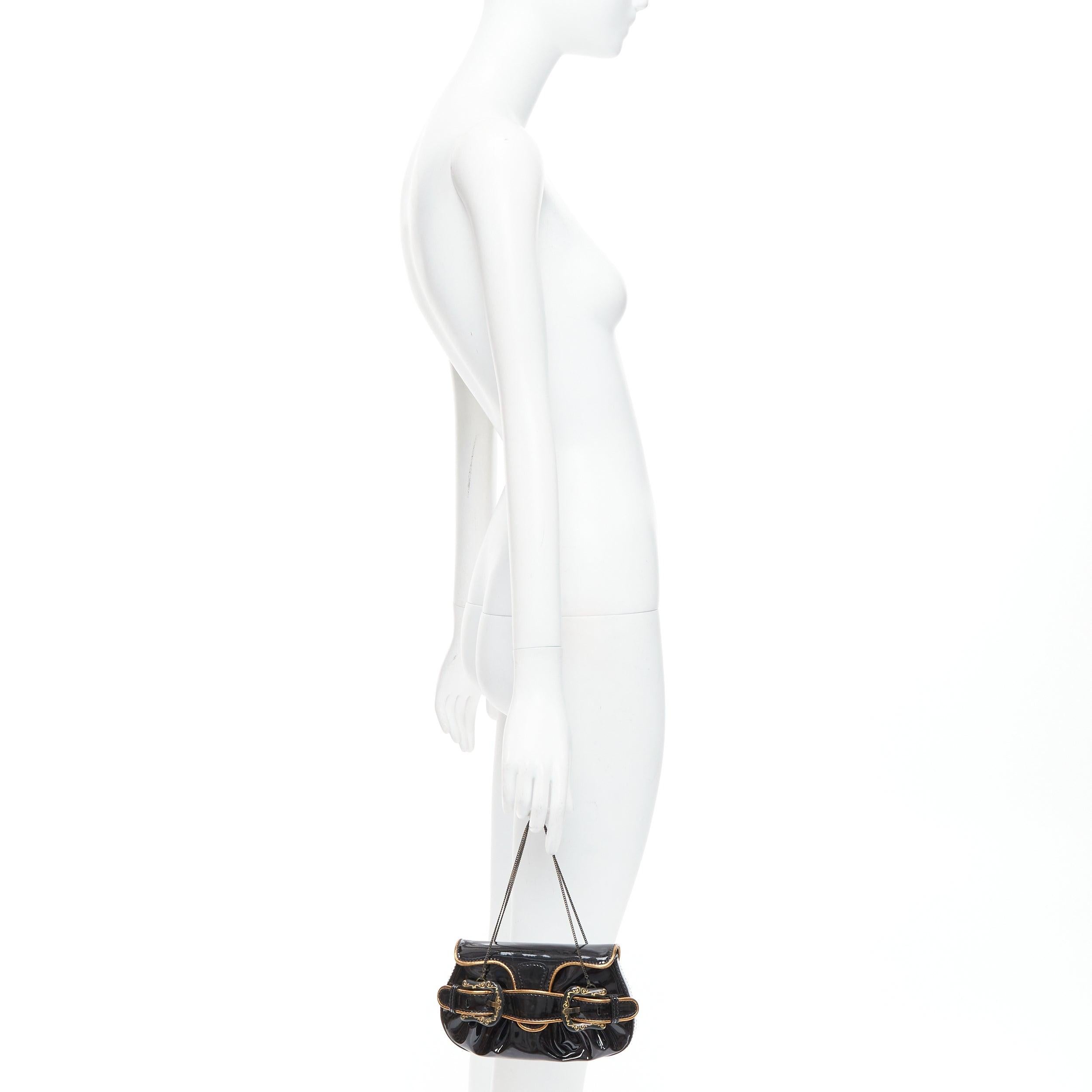 FENDI Mini B black patent baroque FF buckle underarm clutch bag
Reference: TGAS/E00805
Brand: Fendi
Model: Mini B
Material: Leather
Color: Black, Gold
Pattern: Solid
Closure: Loop Through
Lining: Brown Fabric
Extra Details: Fendi Top Handle Bag.