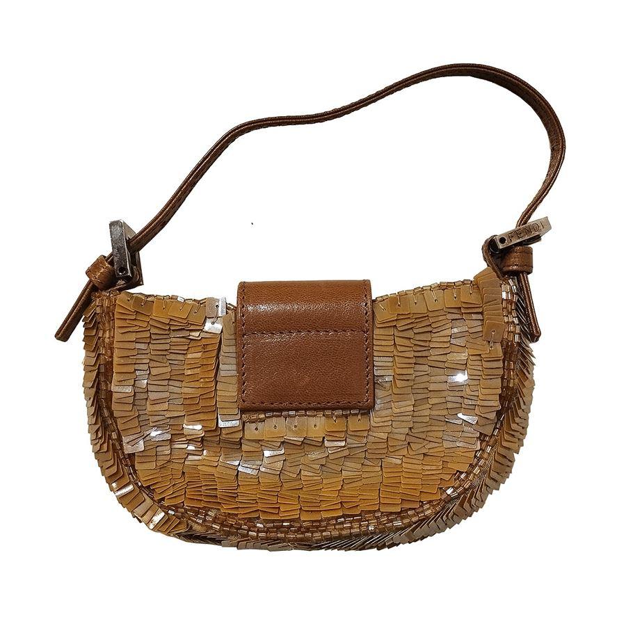 Sequins Ocher color Brown leather Metal buckle Cm 15 x 9 (5,9 x 3,54 inches) With dustbag
