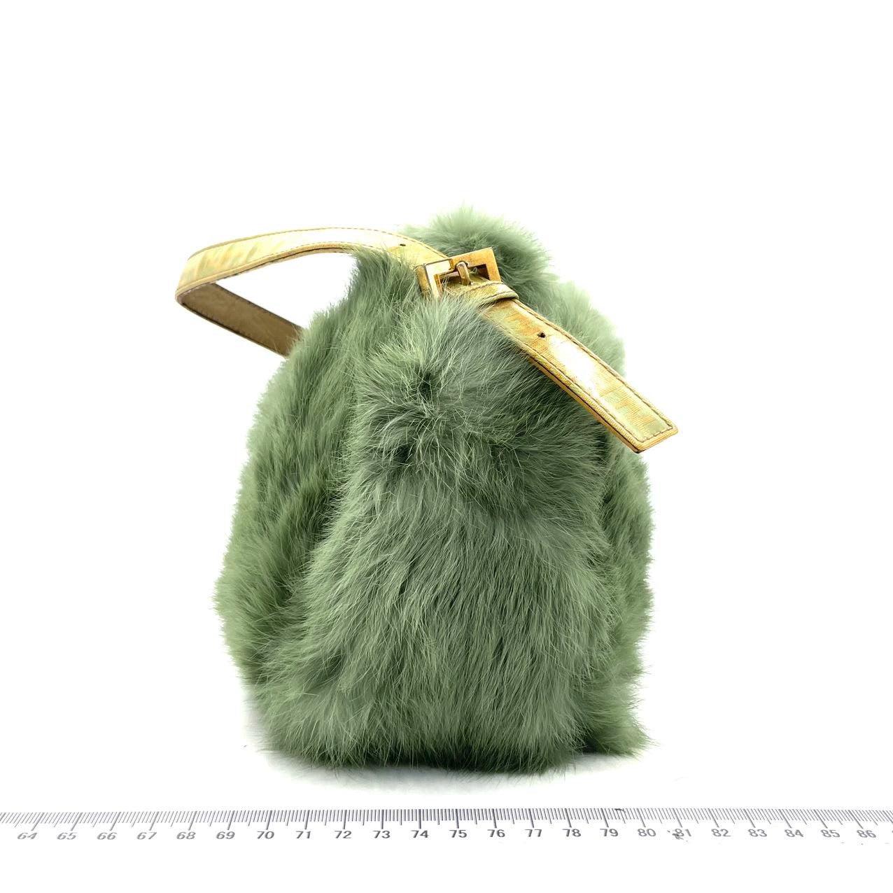 Fendi Mini Mamma Baguette Green Faux Fur
 These are professional photos of the actual bag.
 CONDITION: VERY GOOD
 This preloved/ preowned item is in very good condition with very light signs of use throughout. There may be minor dust on the exterior