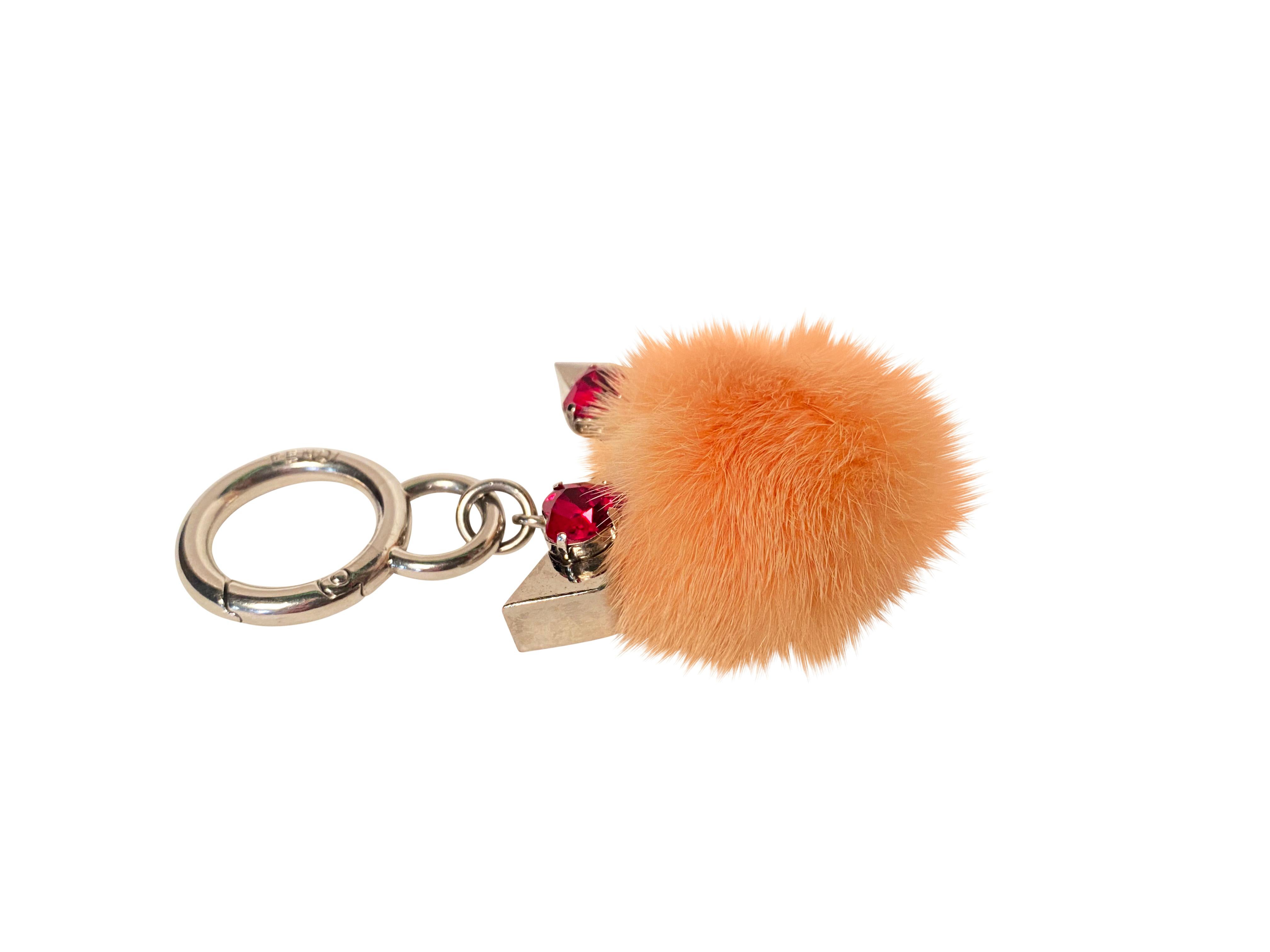 Fendi Mini Monster Eyes key and bag charm in gorgeous soft peach coloured mink fur with silver-toned hardware, red diamante eyes and spring clip closure.

Made in Italy.