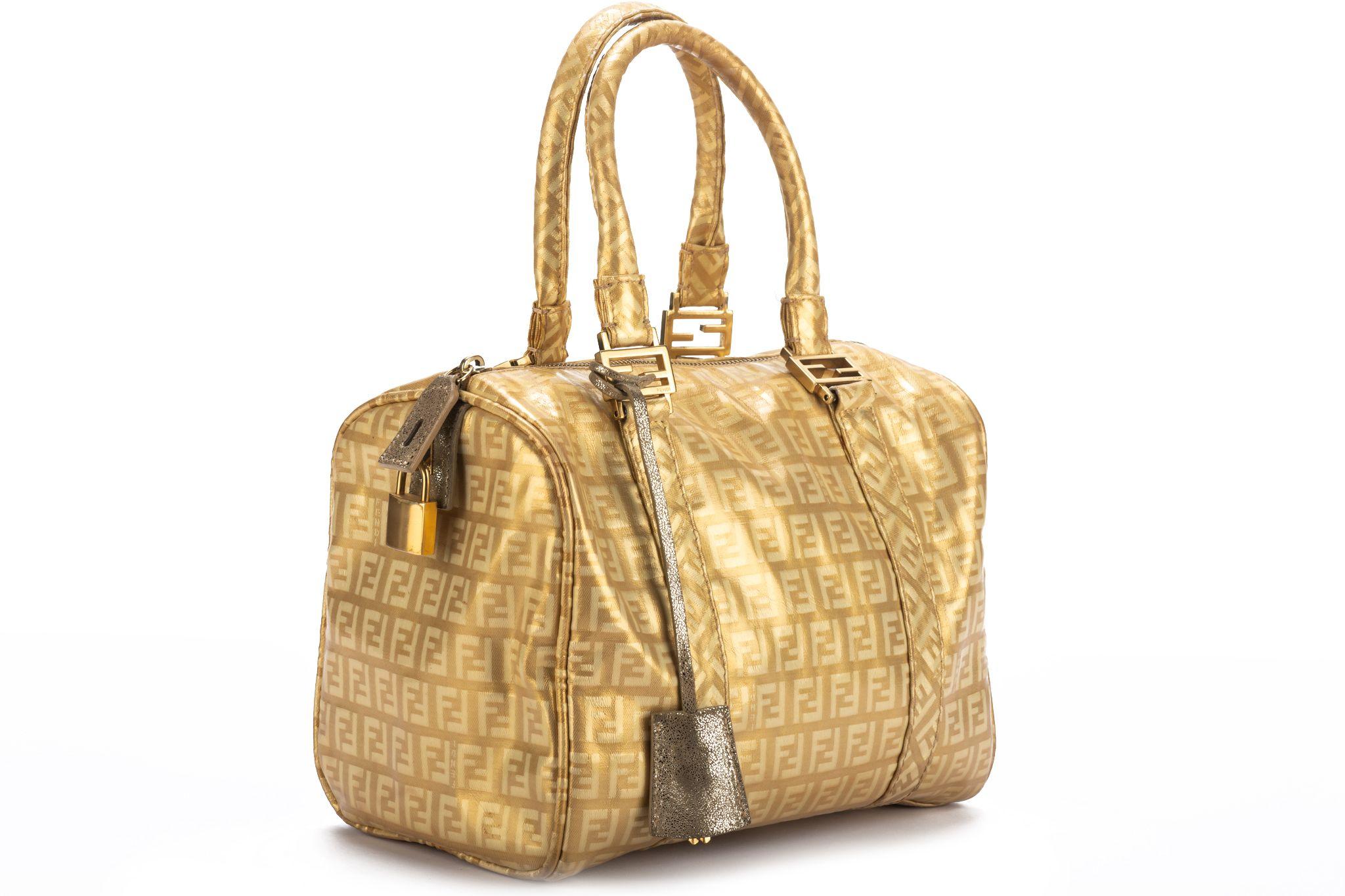 Fendi gold zucchino mini speedy bag in gold . excellent condition, comes with generic dust cover.